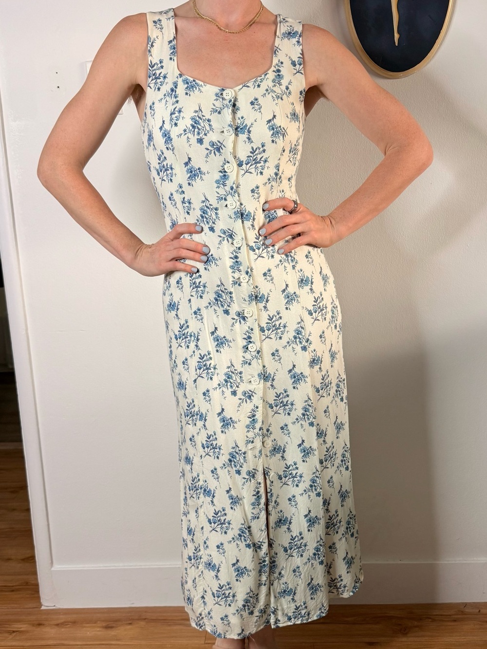 Sleeveless White Dress with Blue Floral Print